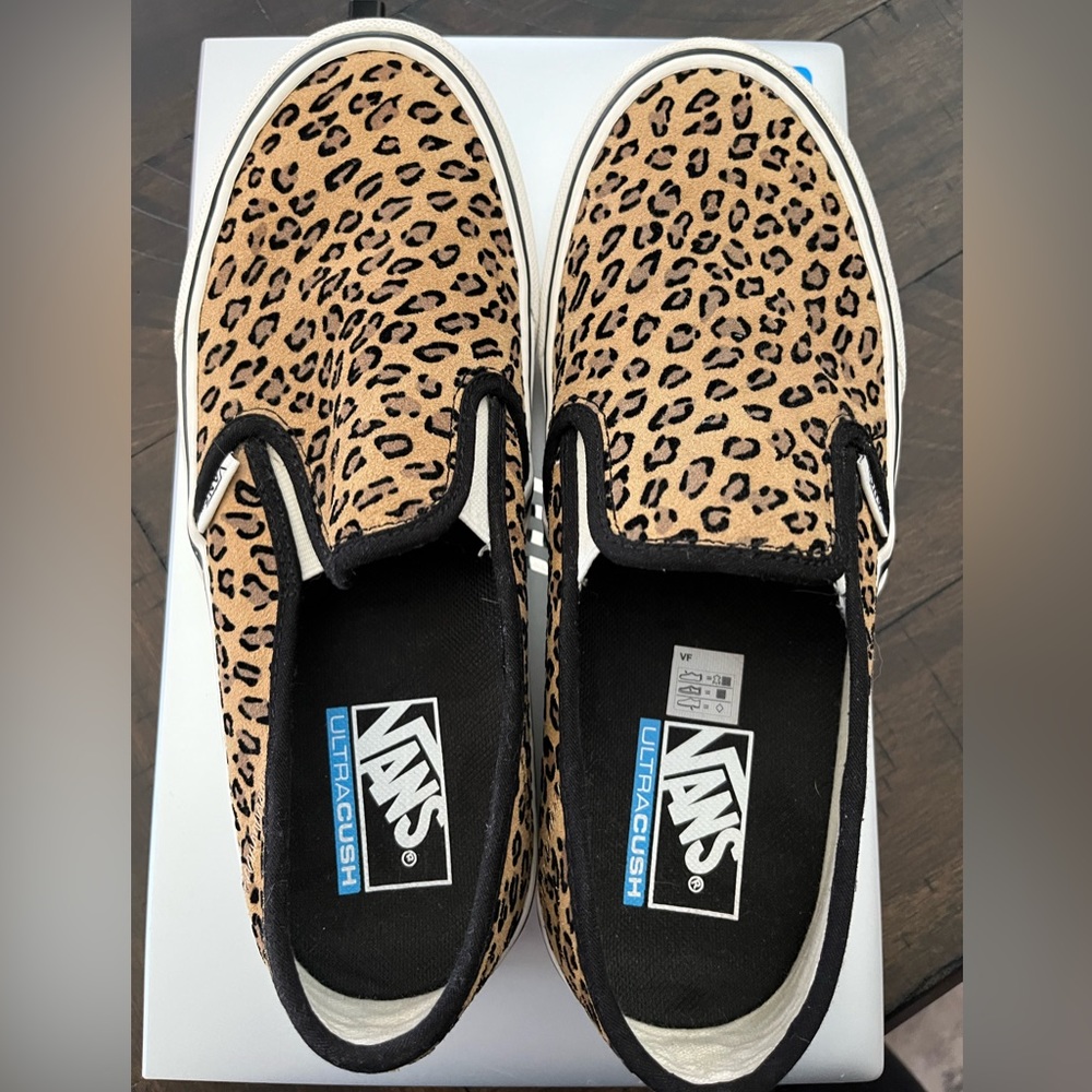 Women’s size 9 Vans suede leopard print slip ons. Like new.